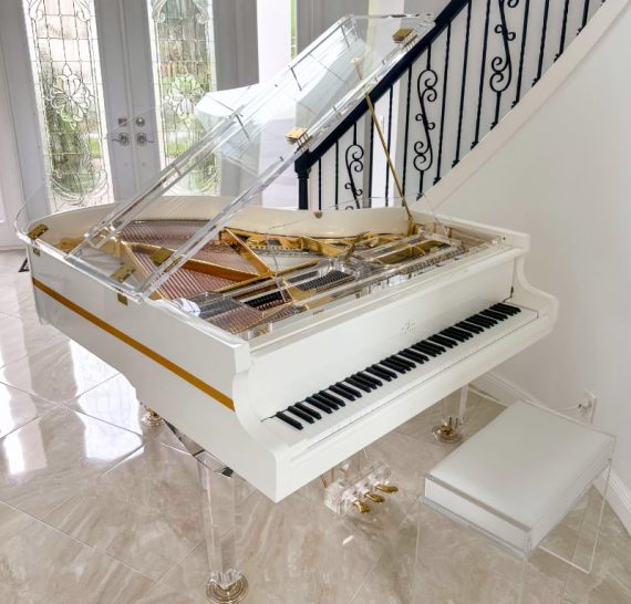 lumiere luxury white piano in a modern home florida